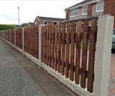 6' x 3' Round Top Picket with Concrete Posts and 6" Concrete Rock Faced Gravel Boards2